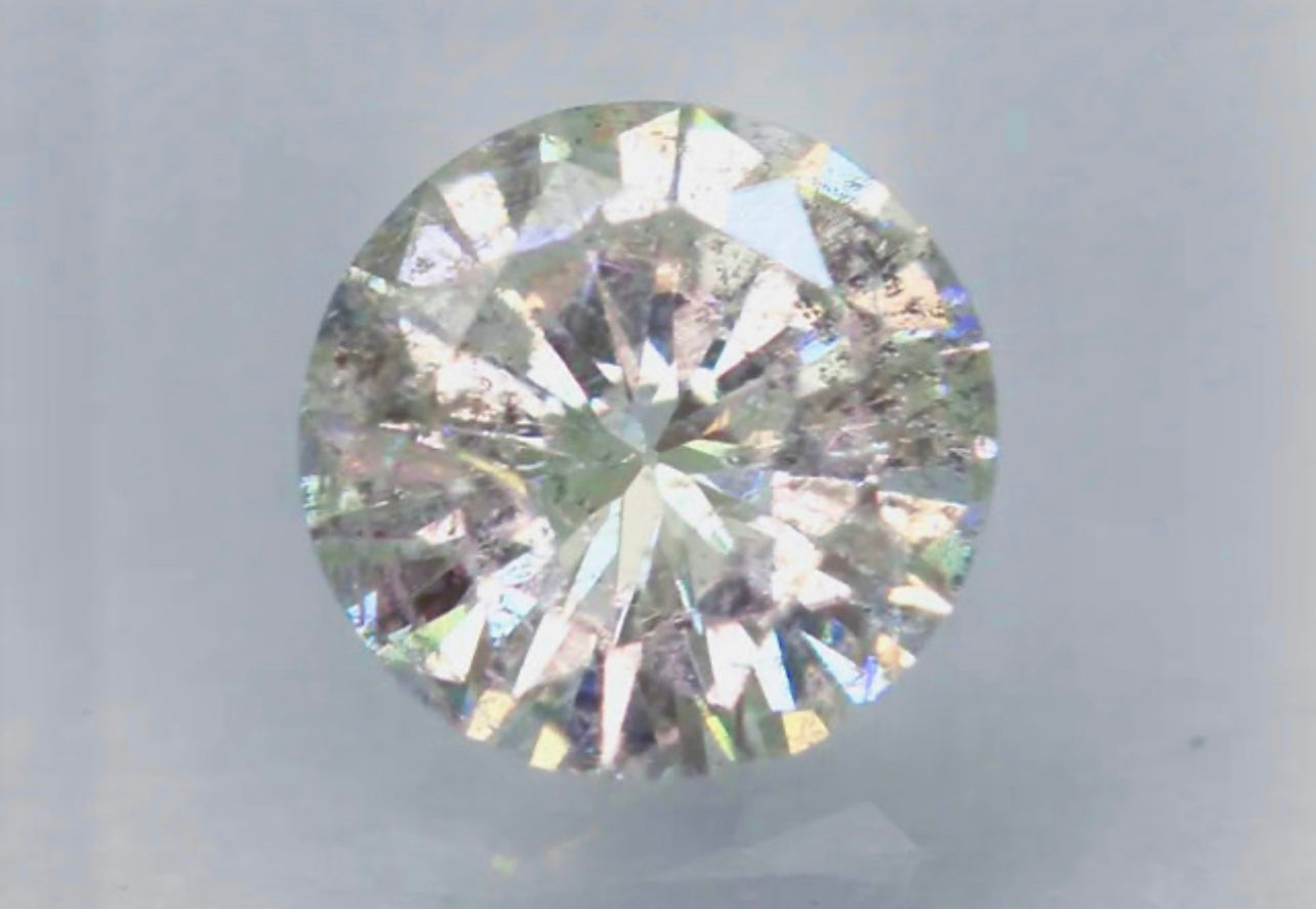 Natural 0.63 Carat Light Silvery Brown Colored Diamond Round Brilliant Cut