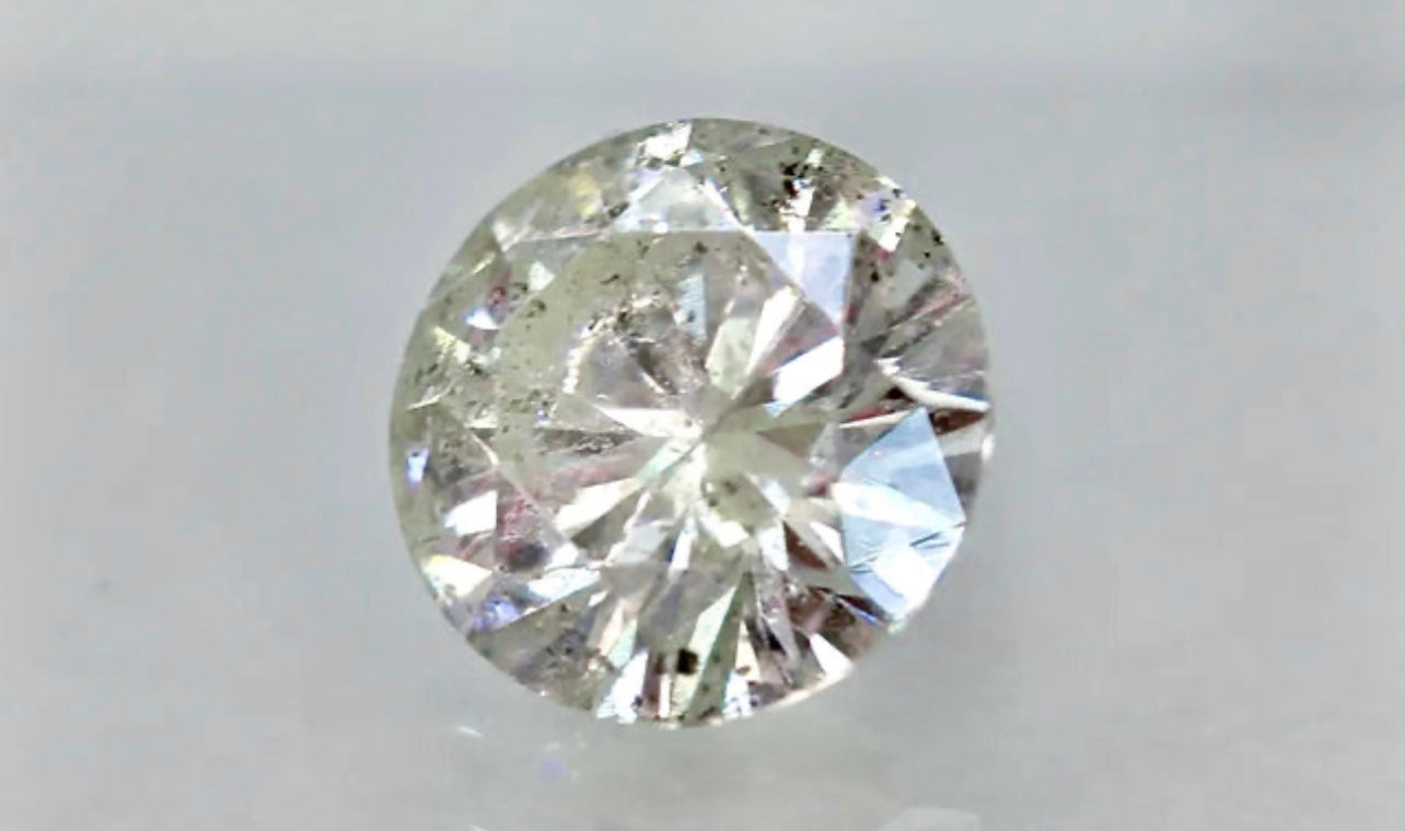 Natural 0.63 Carat Light Silvery Brown Colored Diamond Round Brilliant Cut