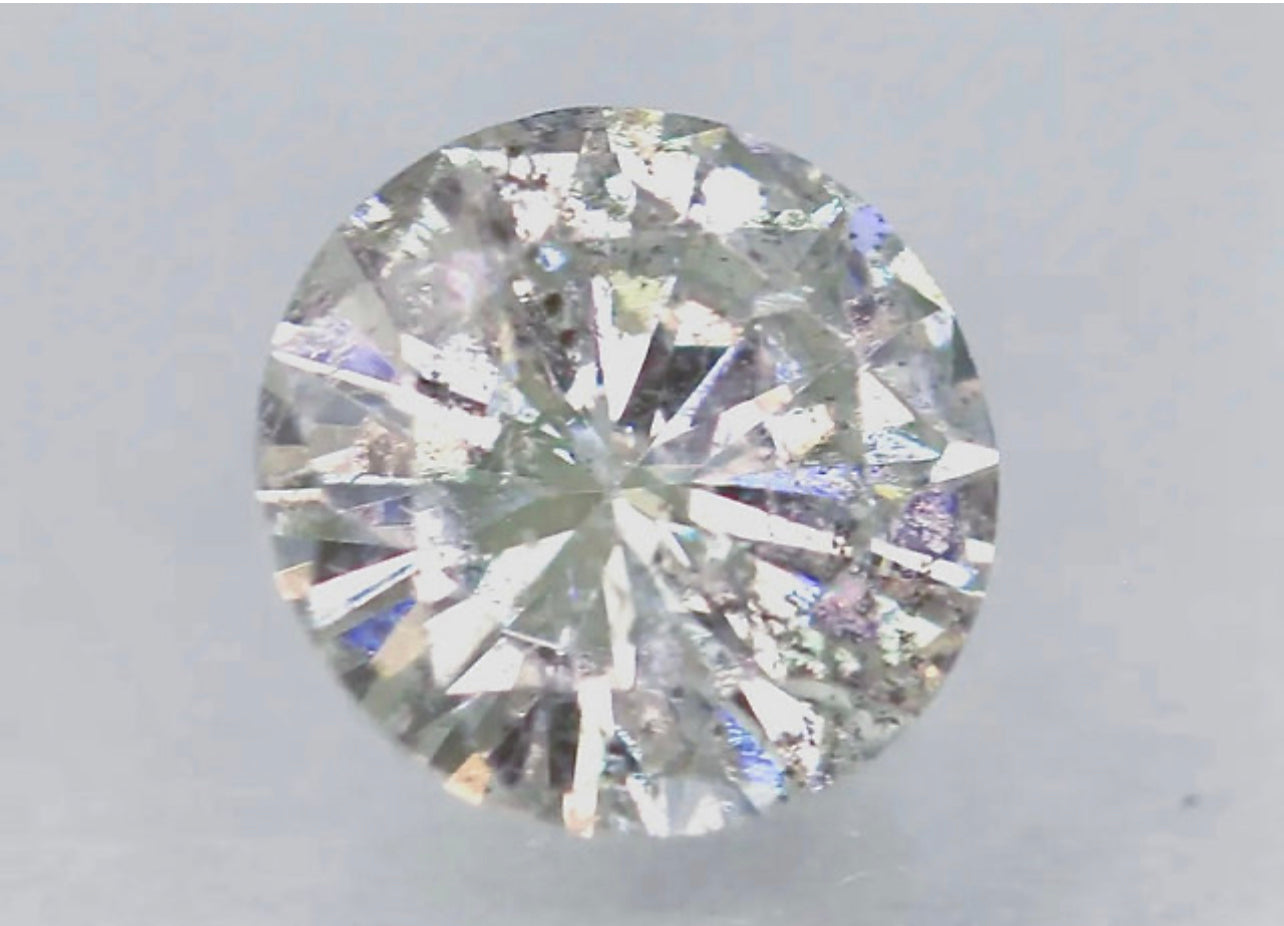 Natural 0.63 Carat Light Silvery Brown Colored Diamond Round Brilliant Cut