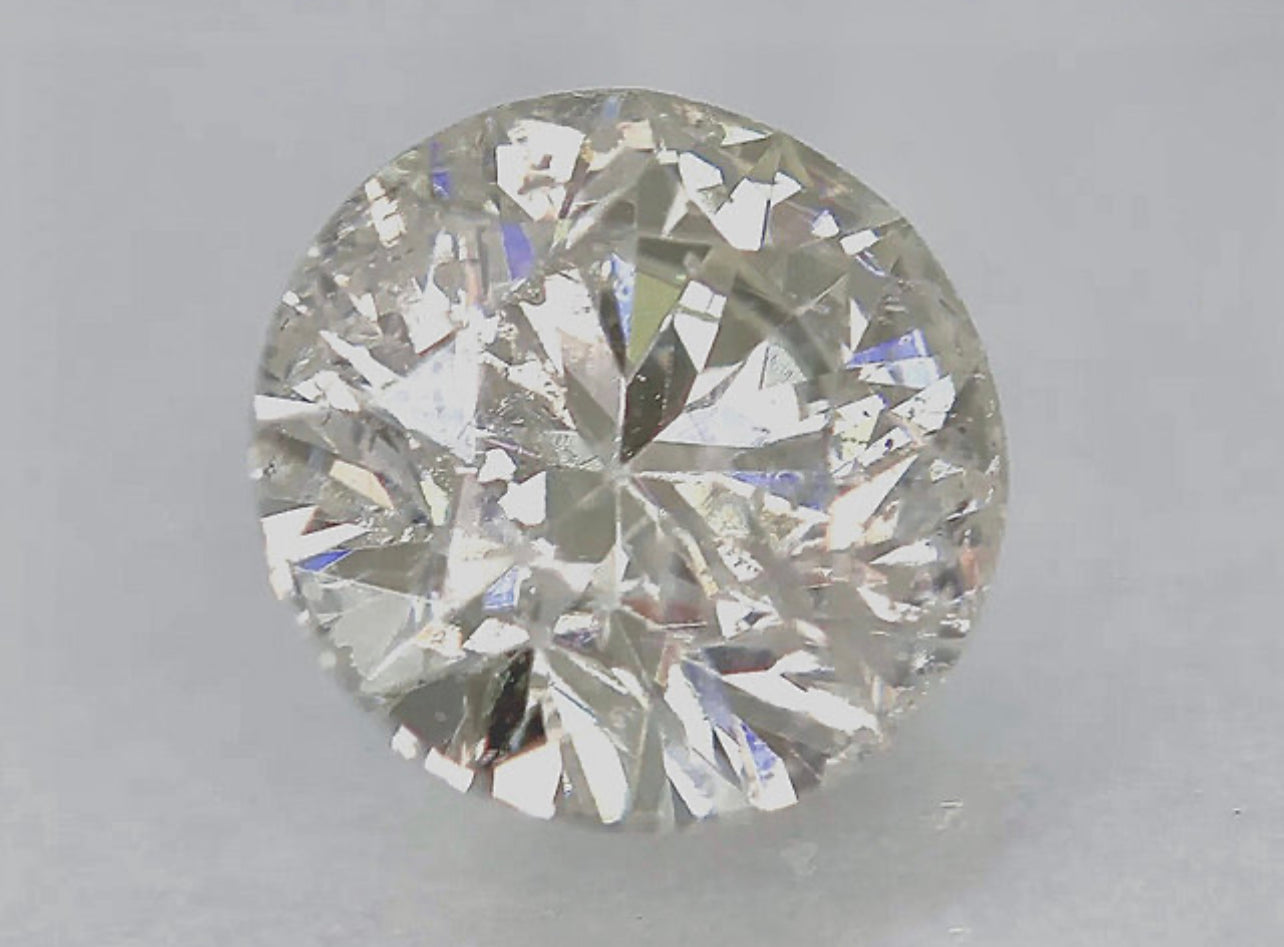 Natural 0.63 Carat Light Silvery Brown Colored Diamond Round Brilliant Cut