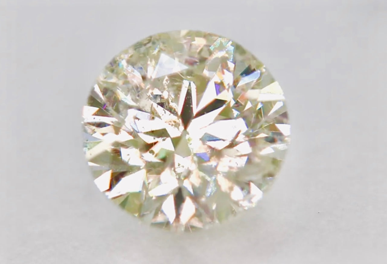 Loose Natural 0.52 Carat Faint Brown Colored Diamond Round Brilliant Cut